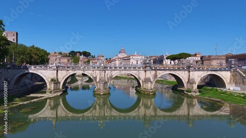 Aerial view of Rome showing the Tiber River winding through the city of ancient architecture. View of the city from above. Travelling through beautiful places of Rome. High quality footage in 4k forma