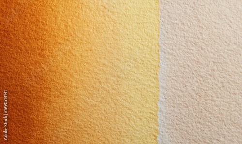 A tan and gold wall with a slightly darker shade of tan