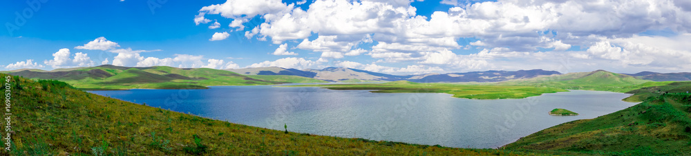 Fototapeta premium Cat dam in Erzurum Turkey on a cloudy scenic day