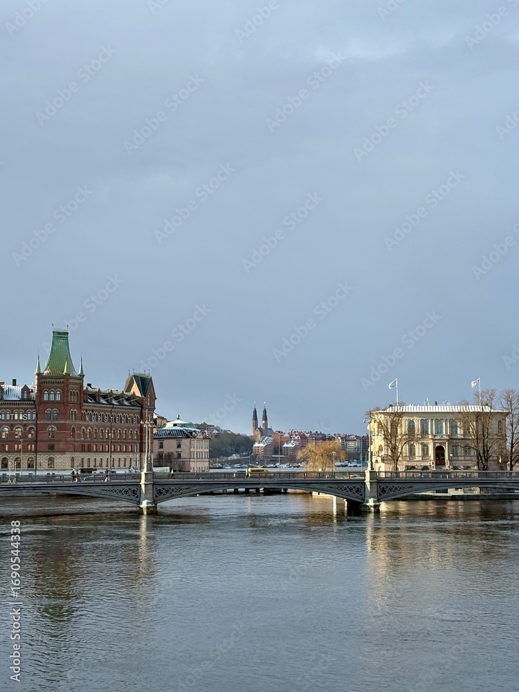 Obraz premium Stockholm Winter Skyline with Snow-Covered Historic Buildings