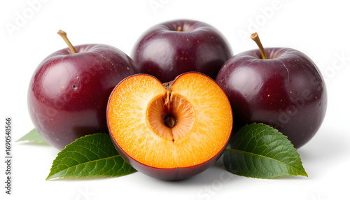 Three ripe plums are displayed, two whole, dark purple plums and one halved plum showing its yellow flesh and pit. 