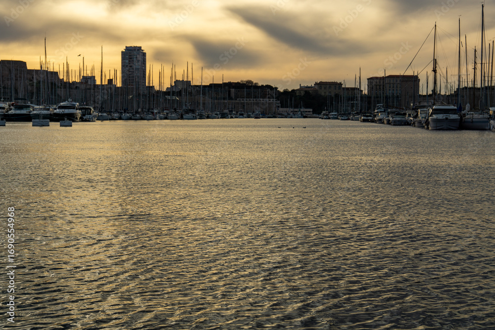 Fototapeta premium Golden Harbor Reflections
