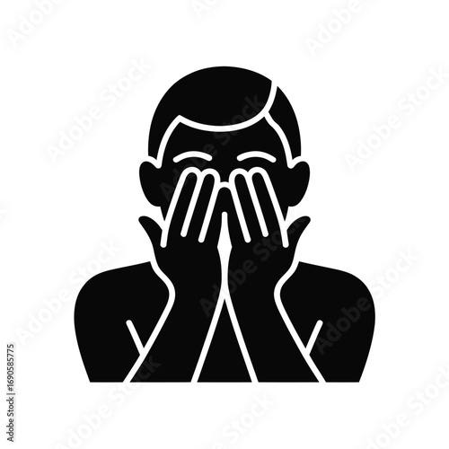 Silhouette of a person covering their eyes with hands image photo