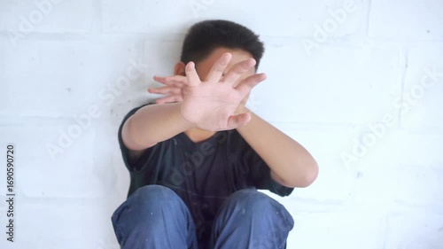 Stop abusing boy violence. child bondage , violence, terrified , A fearful child , Human Rights Day concept.