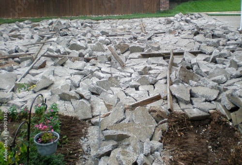 Broken concrete of old driveway in preparation for replacement