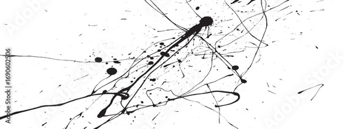 Dynamic black ink splatters and lines conveying movement and energy in abstract black and white design