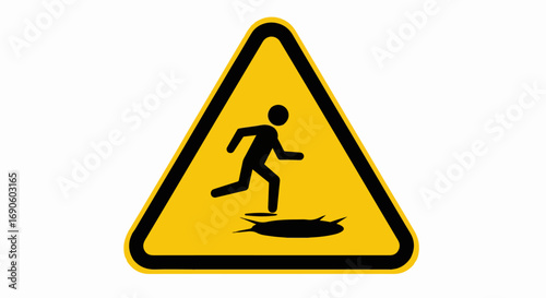 Warning sign depicting a person falling into a hole.