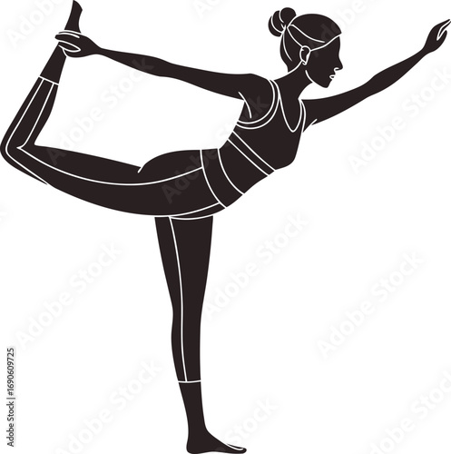 Woman performing natarajasana yoga pose silhouette