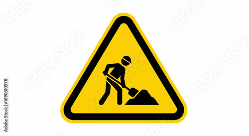 Construction Worker Digging Road Underway.