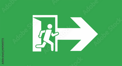Green exit sign with white running man and arrow.
