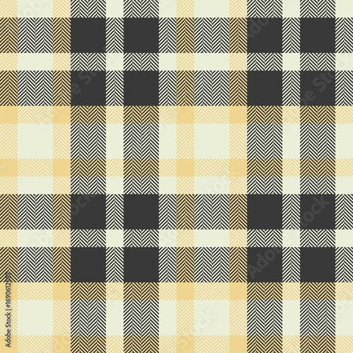Elegant herringbone plaid pattern in soft yellow and gray.  Perfect for textile design, fashion, home decor, or website backgrounds.  This versatile texture evokes warmth and sophistication.