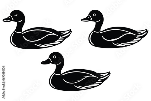 Three black silhouette ducks in a row on a white background