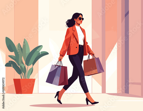 Stylish woman walking with shopping bags in the city.