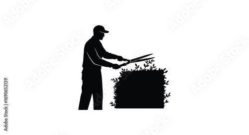 a man tending to plants in a garden silhouette