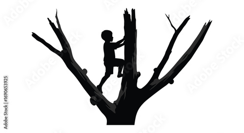 a child climbs high on barren tree branches