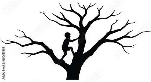 a child climbs high in barren tree branches silhouette