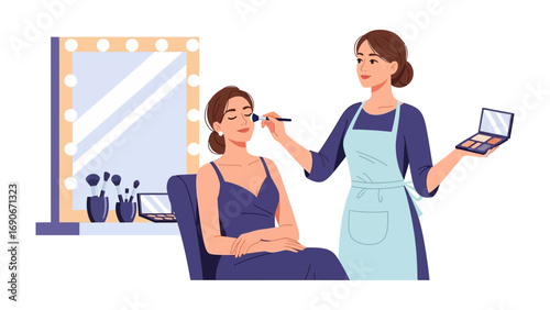 Professional makeup artist applying cosmetics to a woman sitting in a chair in front of a lighted vanity mirror