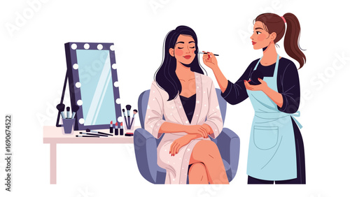 Professional makeup artist applying cosmetics to a woman sitting in a chair in front of a lighted vanity mirror