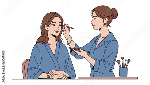 Young woman applying makeup to another woman s face with brushes and palette in a beauty salon or home setting