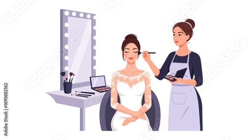 Professional makeup artist applying elegant bridal makeup to a beautiful bride in a well lit dressing room with a vanity mirror