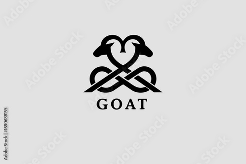 Monochrome goat emblem: a minimalist vector inspired by ibex and mountain goat silhouettes, featuring a refined goat head icon for vintage logo, farm & dairy, and outdoor adventure