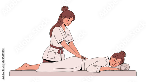Traditional asian massage therapist performing therapeutic back massage on a woman lying on a mat