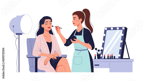 Professional makeup artist applying makeup to a female client in a beauty salon with a ring light and vanity mirror