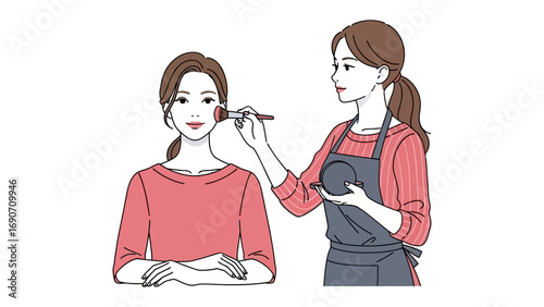 Young woman applying makeup to another woman s face with a brush in a beauty salon or home setting
