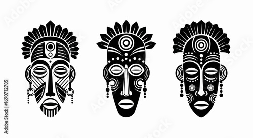 Three African Tribal Masks with Intricate Designs.