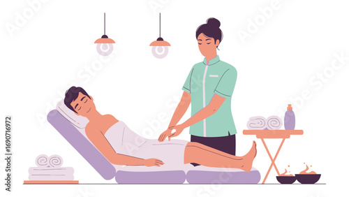 Professional beautician performing a relaxing leg massage on a client lying on a spa treatment bed in a bright clean salon