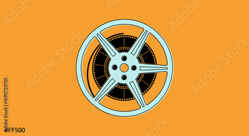 Vintage Film Reel with Perforated Edges and Spool.