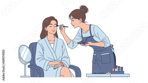 Young woman in a bathrobe receiving makeup application from a professional makeup artist in a beauty salon setting