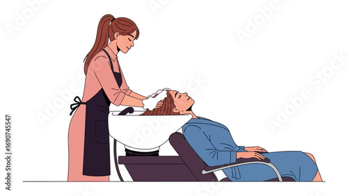 Friendly female hairdresser washing a client s long brown hair in a salon shampoo bowl with a gentle smile