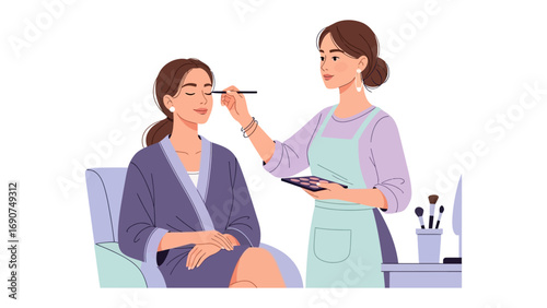 Professional makeup artist applying eyeshadow to a seated woman in a salon or studio setting with beauty tools