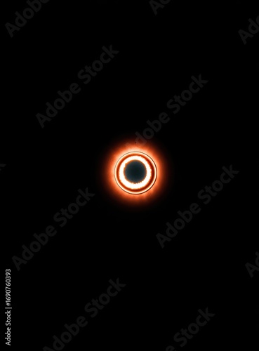 Fiery, glowing ring of light against a black void