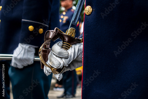 Soldier holding command saber, Military with sword in ceremony, Armed forces in protocol act. High quality photo