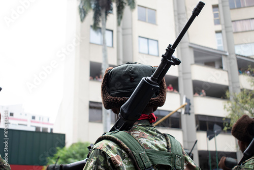 Soldier with Galil rifle, Armed military with Galil gun, Armed forces carrying Galil weapon. High quality photo