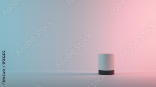 A white cylindrical object with a black base stands on a white surface against a gradient background.