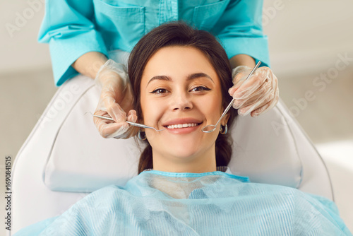 Fotografie Dentist exam, teeth, gums, dental care exam, happy smiling woman healthy smile a