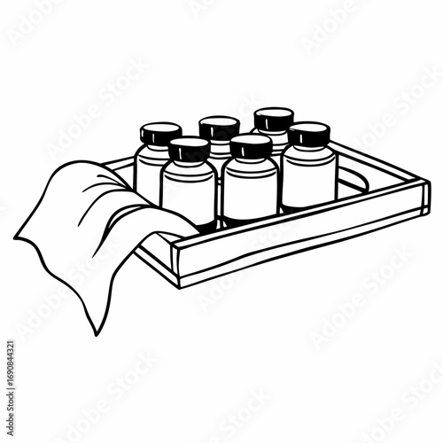 Illustration of six bottles with caps on a tray with a cloth draped over the edge of the tray