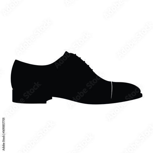 Black silhouette of a classic mens captoe Oxford dress shoe side profile view.