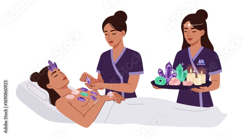 Skilled practitioners administer cupping therapy to a relaxed woman lying down for holistic wellness and therapeutic body treatment