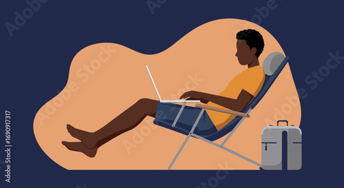 Young man relaxing in a reclined chair, working efficiently on his laptop, embodying remote work and a flexible modern lifestyle.