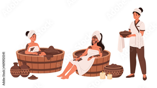 Two women relaxing in traditional wooden tubs with towels on their heads receiving spa treatments from a therapist