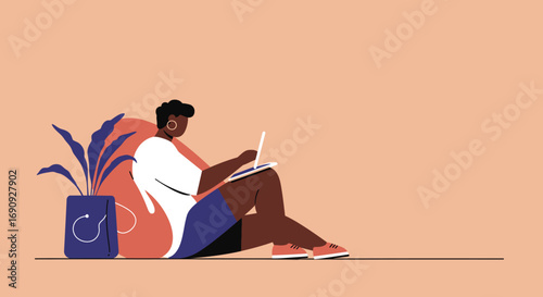 Relaxed woman working or learning on a tablet with a stylus, sitting comfortably on a beanbag next to a plant. Modern digital lifestyle.