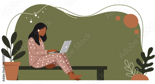 Young woman in pajamas comfortably works from home on her laptop with wireless earphones, embodying modern remote work and a relaxed digital lifestyle.