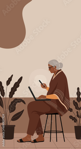 Senior woman working remotely, using a laptop and smartphone in a relaxed, modern setting. Represents technology for older generations, productivity, and flexible work.