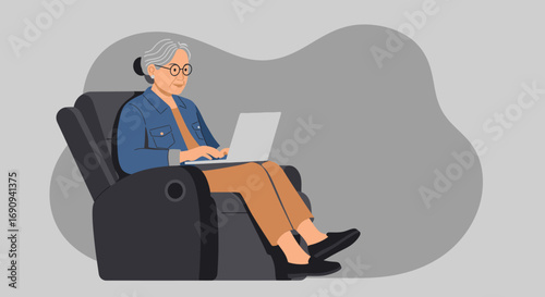 Elderly woman comfortably using a laptop in an armchair, depicting an active senior embracing technology for communication, learning, or leisure.