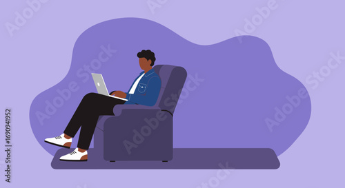 Individual comfortably using a laptop from an armchair. Ideal for remote work, online learning, or digital lifestyle concepts.