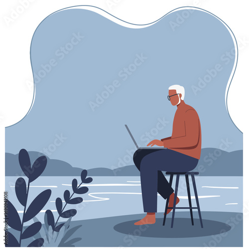 Senior man working on a laptop outdoors by a tranquil lake. Represents remote work, flexible retirement, or modern senior lifestyle and connectivity.
